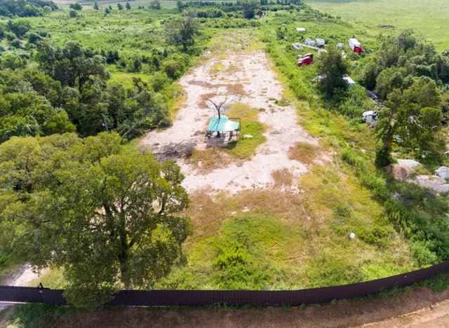 a view of a garden with pathway