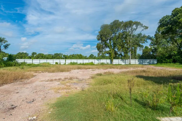 a view of a lake with a big yard