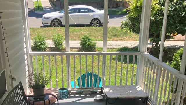 a view of a porch with furniture