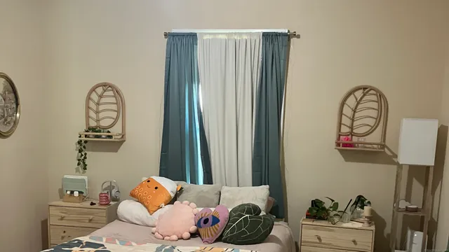 a bathroom with a shower and a sink