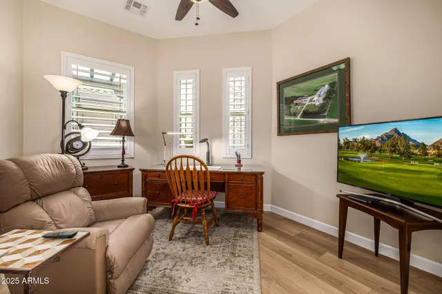 a living room with furniture and a window