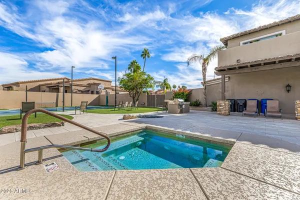 a view of a golf course with a big yard