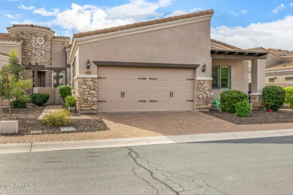 front view of a house with a street