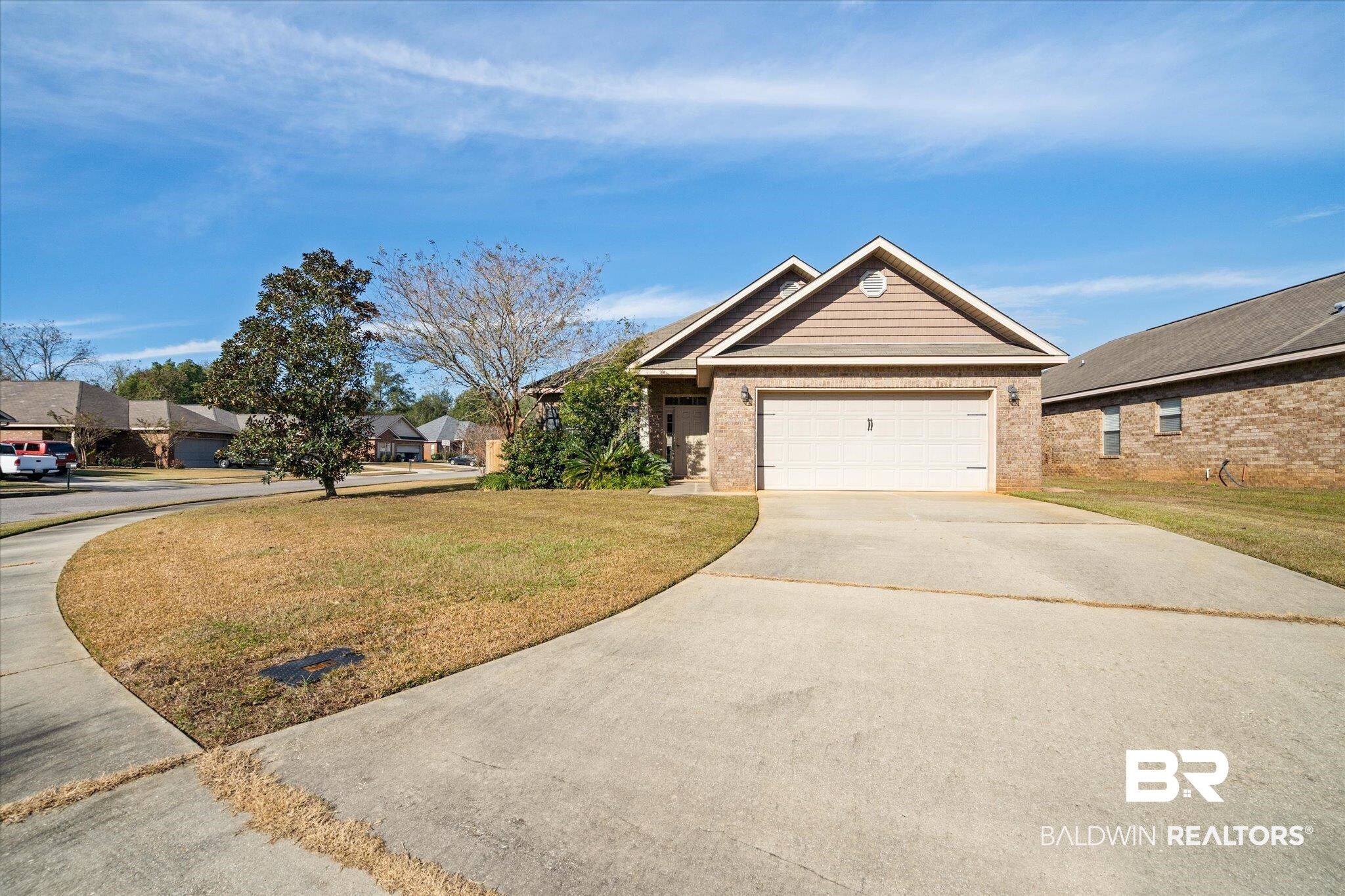 10251 Fionn Loop Daphne, AL 36526 - Photo 1 of 28 View of front of property featuring a garage and a front yard