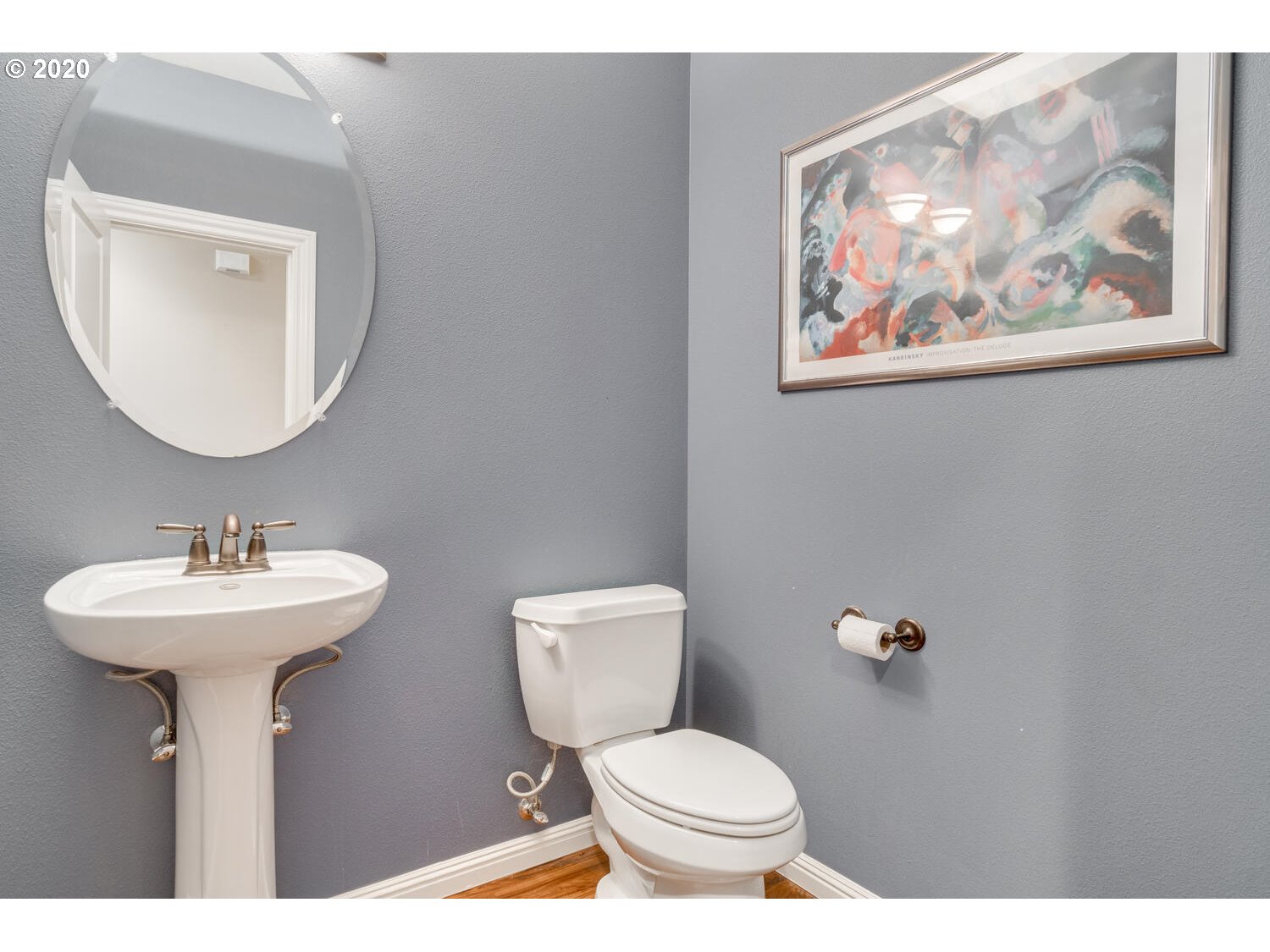 9245 Southwest Rambler Lane Portland, OR 97223 - Photo 15 of 19 a bathroom with a toilet sink and mirror