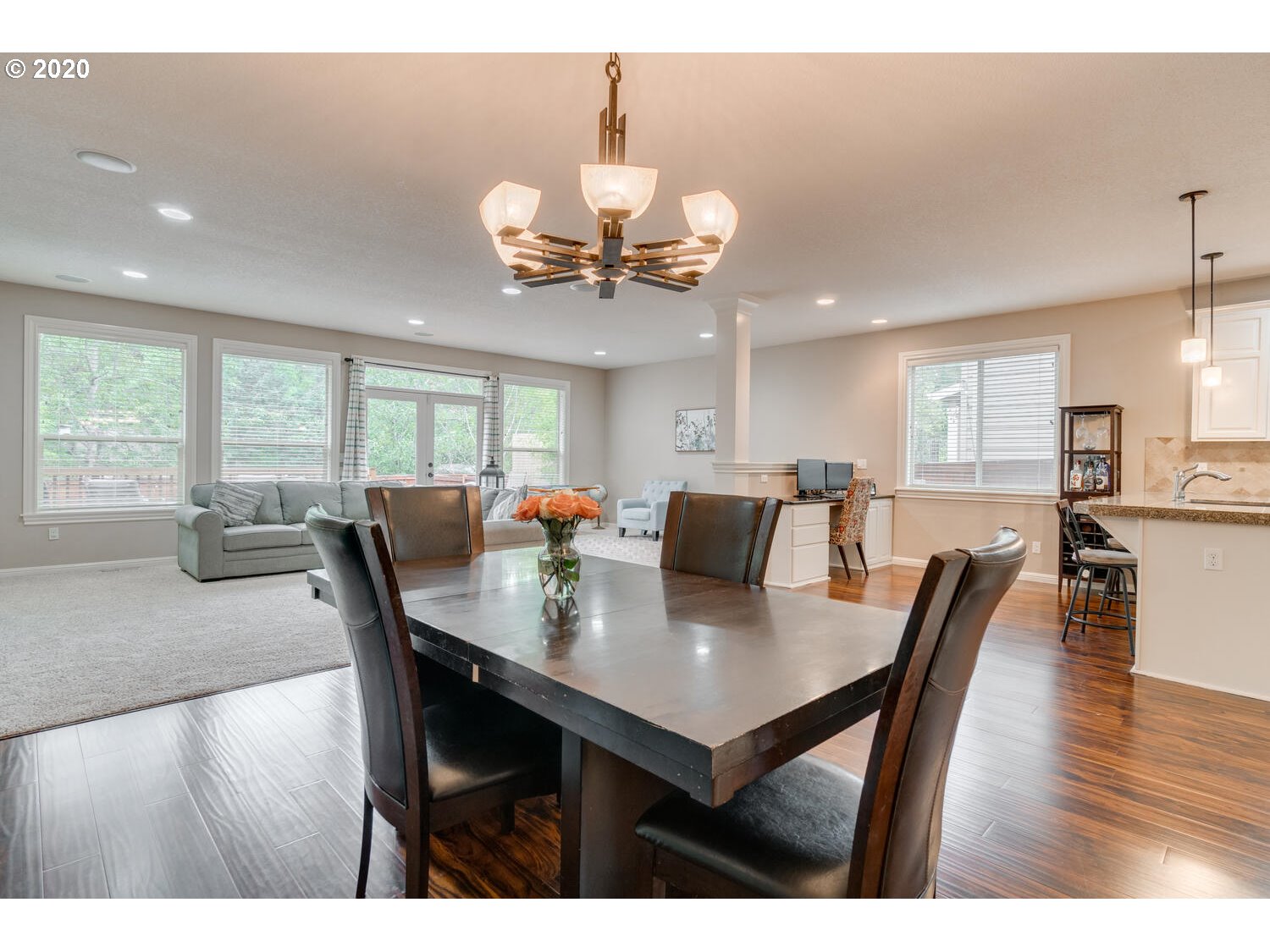9245 Southwest Rambler Lane Portland, OR 97223 - Photo 4 of 19 a view of a dining room with furniture and wooden floor