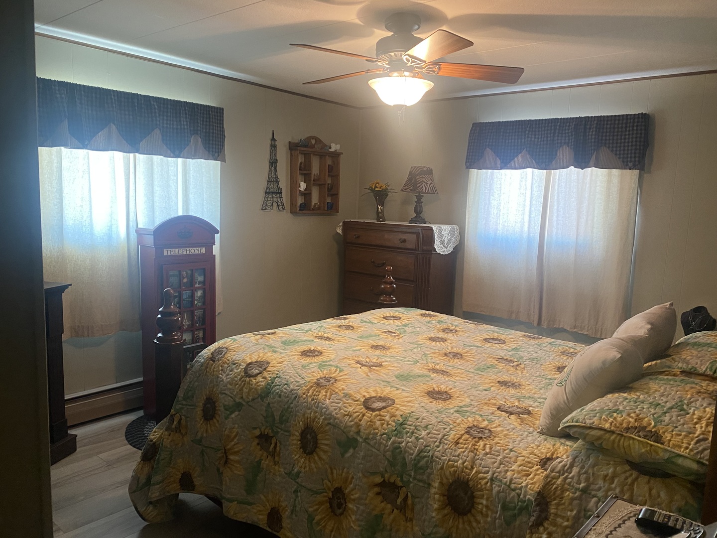 206 Maple Street Cedar Point, IL 61316 - Photo 6 of 15 a bedroom with a bed and a chandelier