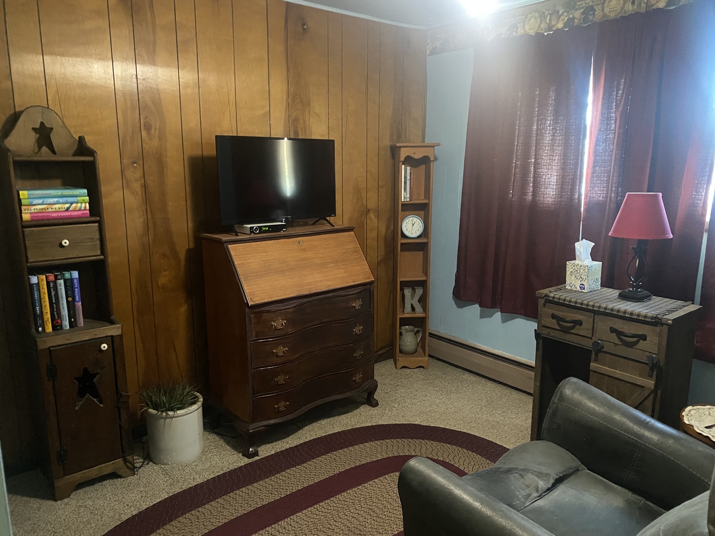 206 Maple Street Cedar Point, IL 61316 - Photo 10 of 15 a room with furniture and a flat screen tv