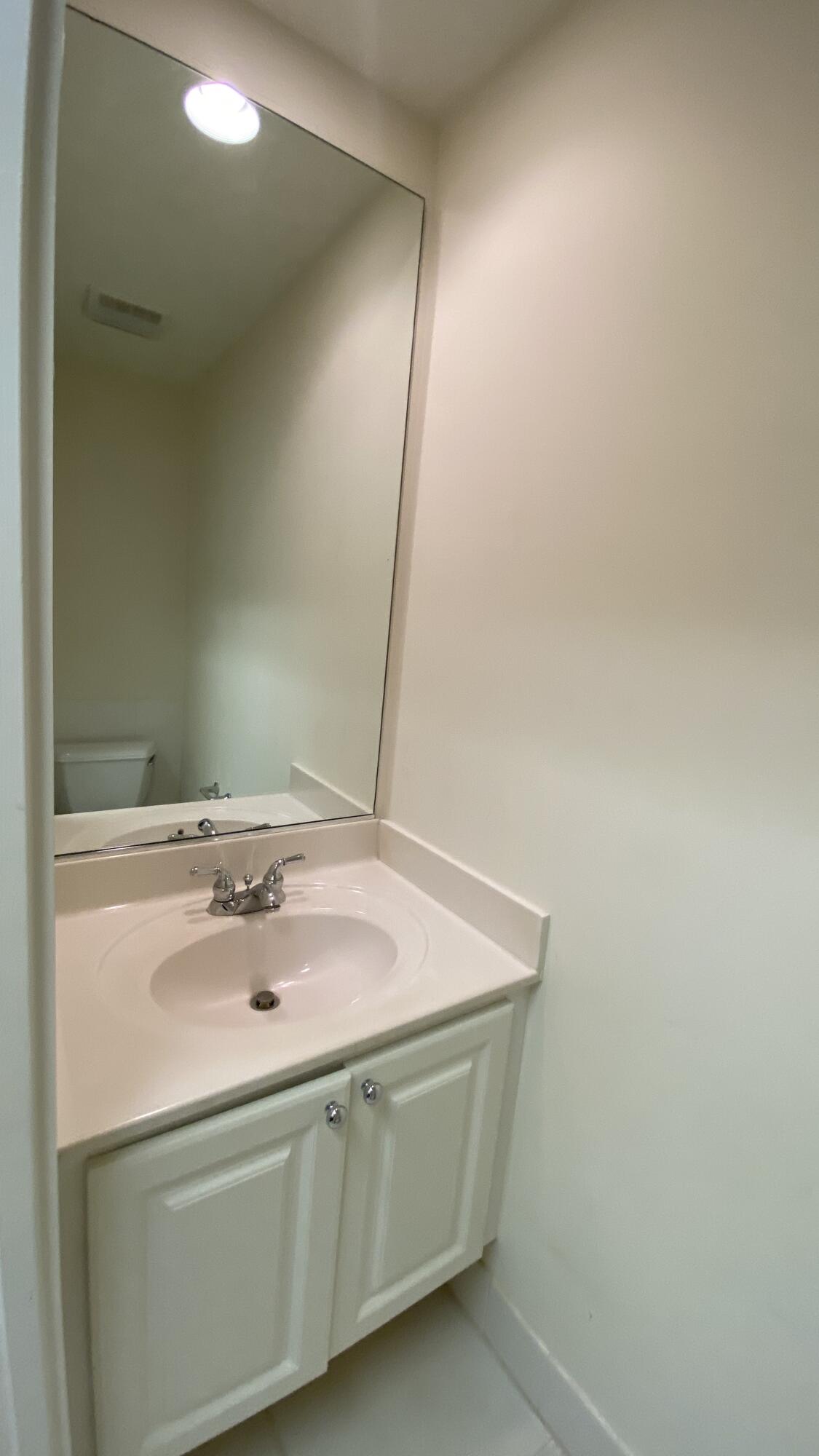 3200 West Community Drive Jupiter, FL 33458 - Photo 24 of 31 a utility room with a sink