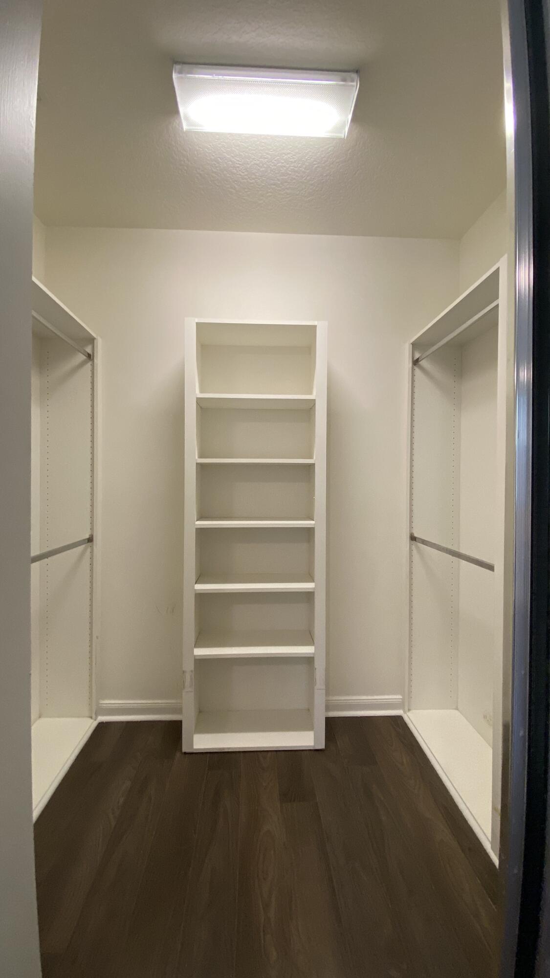 3200 West Community Drive Jupiter, FL 33458 - Photo 28 of 31 a view of walk in closet with empty racks