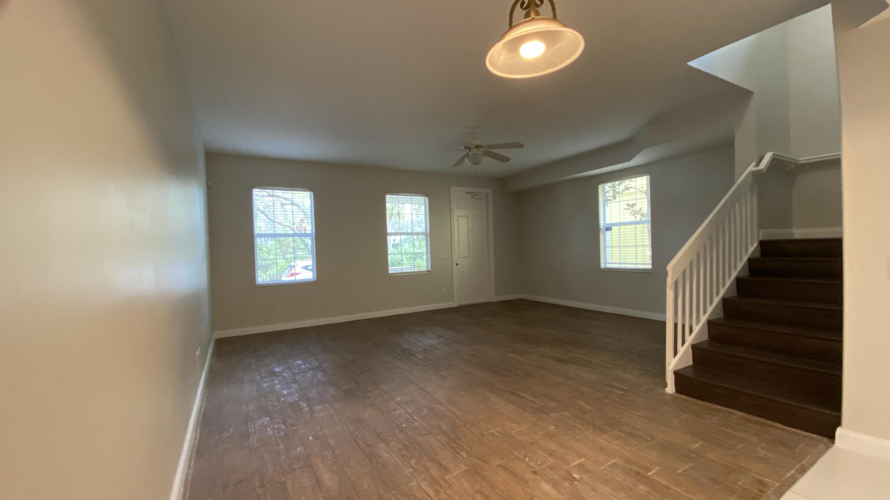 3200 West Community Drive Jupiter, FL 33458 - Photo 7 of 31 an empty room with windows