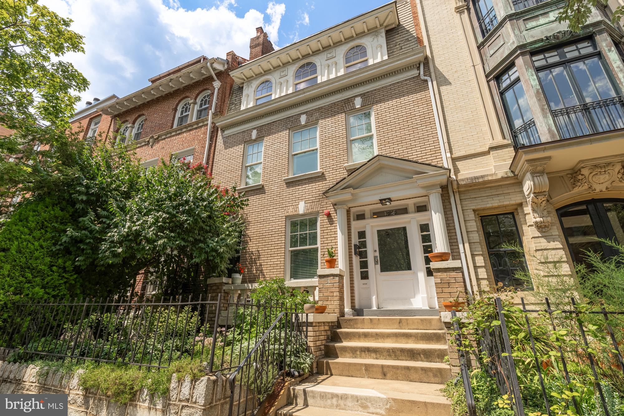 1845 Kalorama Road Northwest, Unit 1 Washington, DC 20009 - Photo 2 of 39 a front view of a multi story residential apartment building