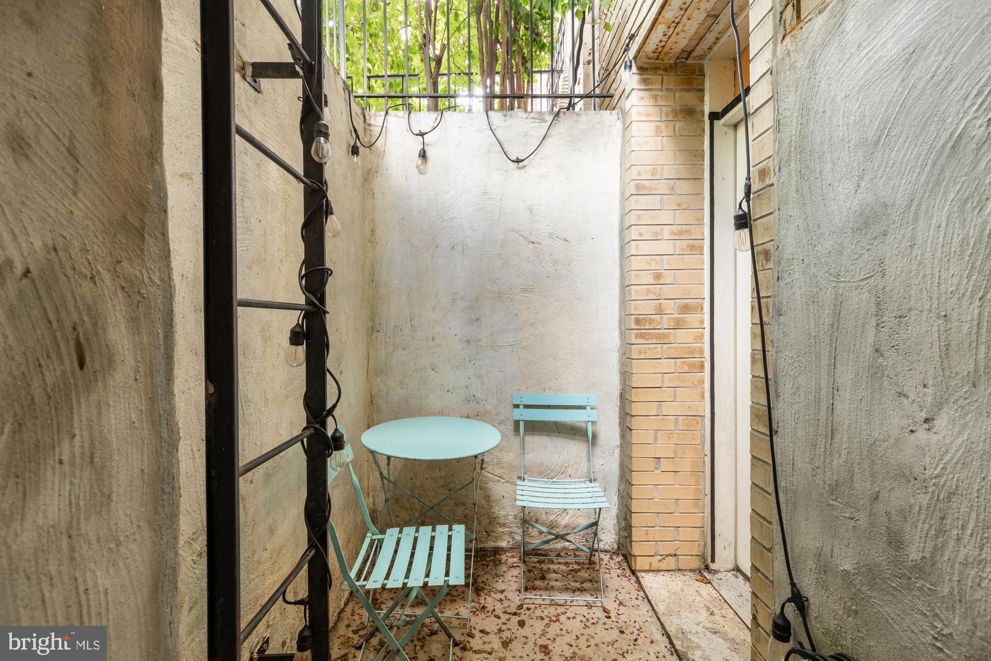 1845 Kalorama Road Northwest, Unit 1 Washington, DC 20009 - Photo 26 of 39 a bathroom with a granite countertop shower and a sink