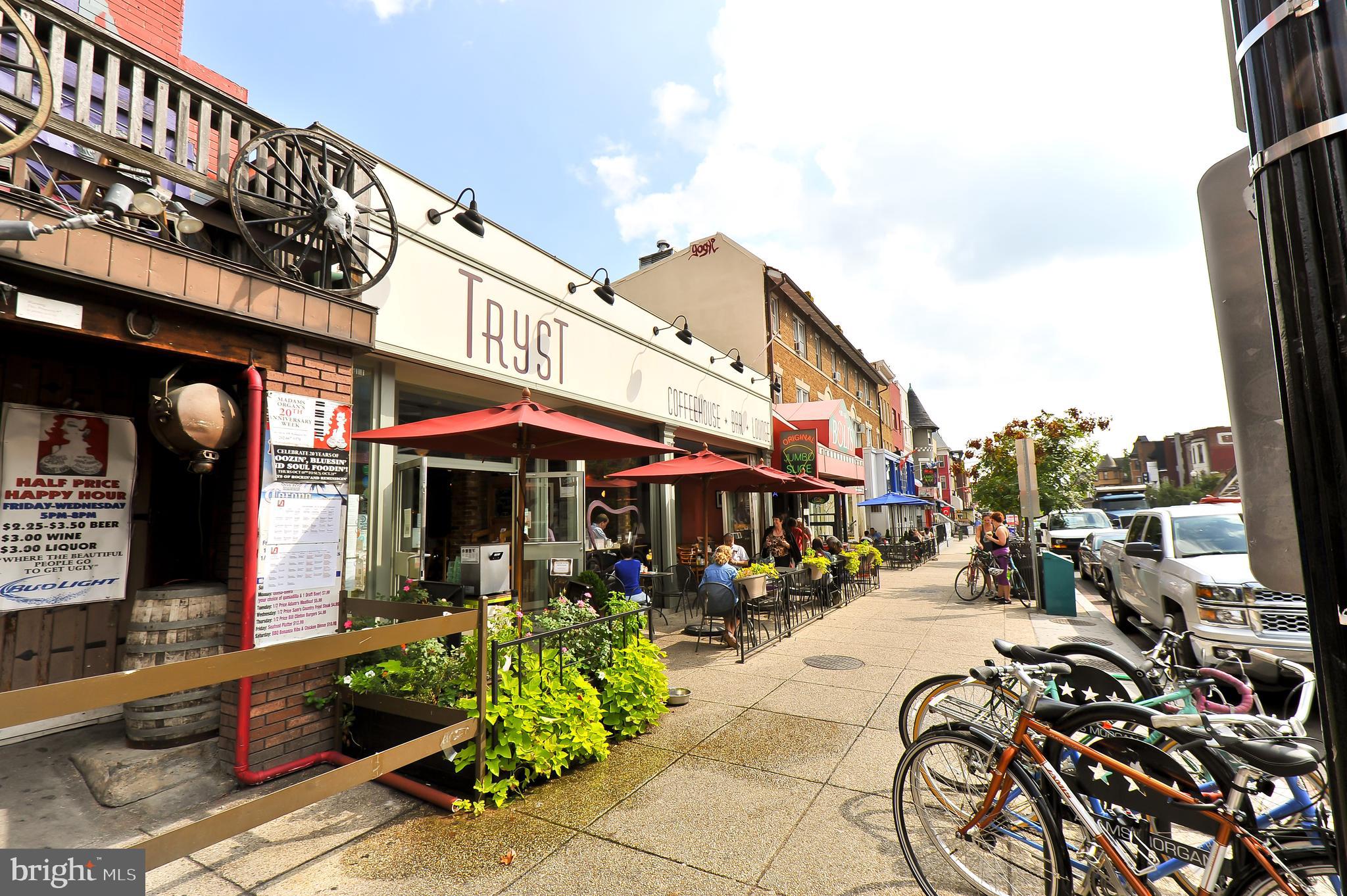 1845 Kalorama Road Northwest, Unit 1 Washington, DC 20009 - Photo 33 of 39 a view of a cafe with sitting area
