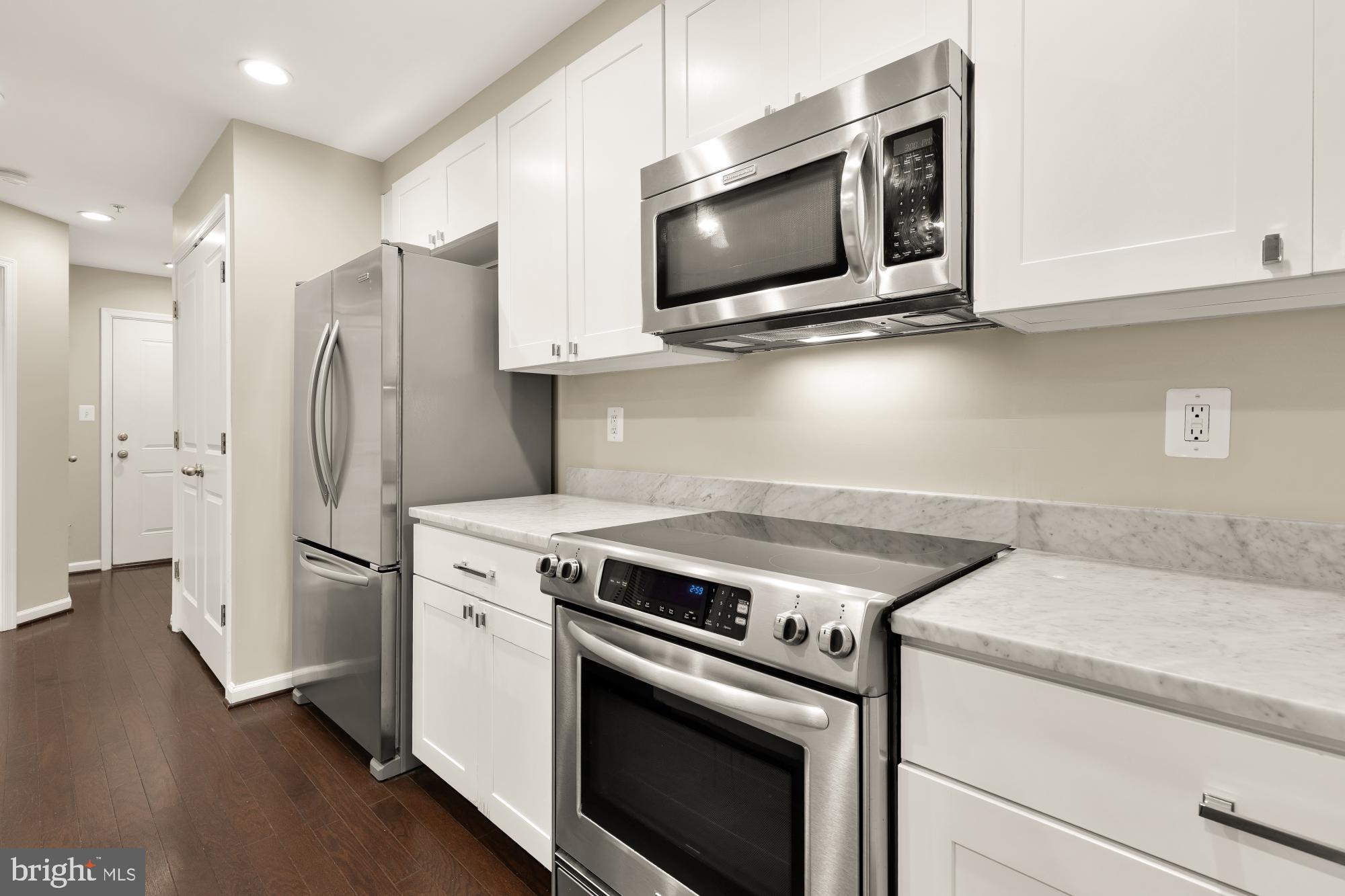 1845 Kalorama Road Northwest, Unit 1 Washington, DC 20009 - Photo 9 of 39 a view kitchen with stove and refrigerator