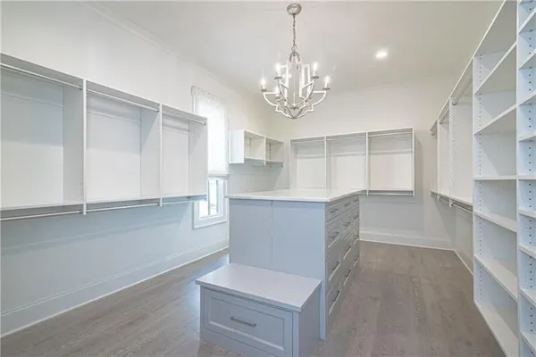 a view of kitchen with cabinets and wooden floor