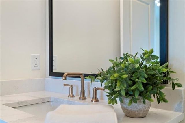 a vase of flowers sitting on a table