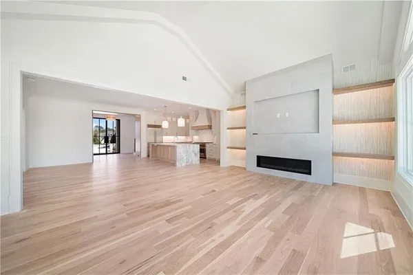 a view of a livingroom with wooden floor