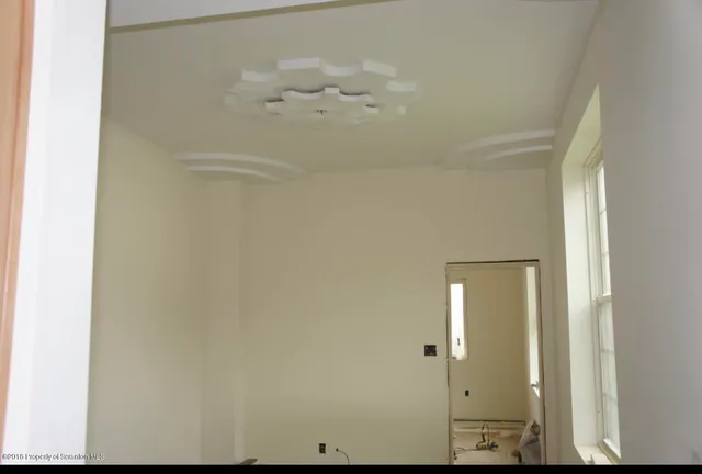 a bathroom with a sink toilet and tub