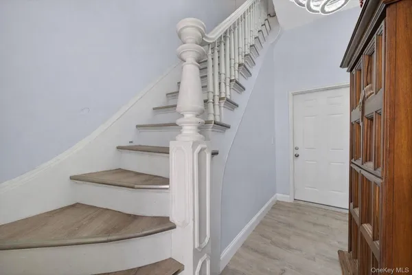 a view of hallway with stairs