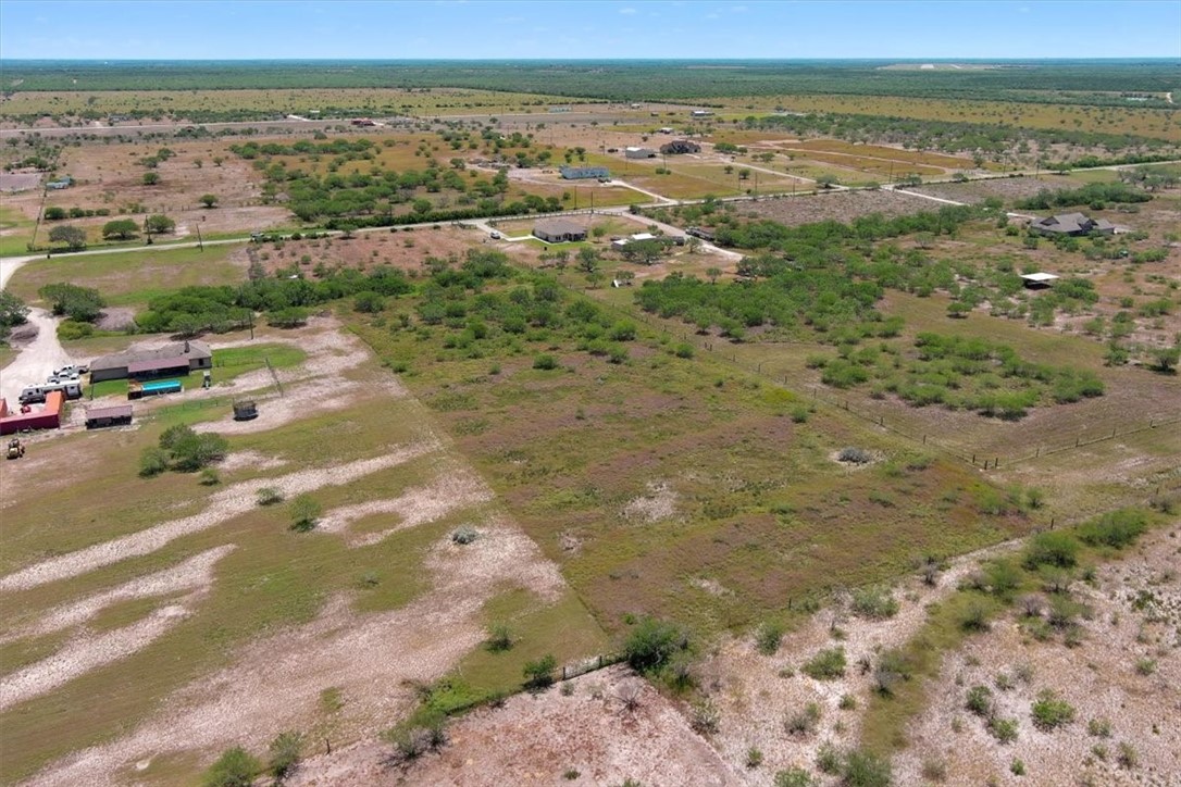 253 County Road 222 Orange Grove, TX 78372 - Photo 17 of 22 a view of an ocean view with lots of trees