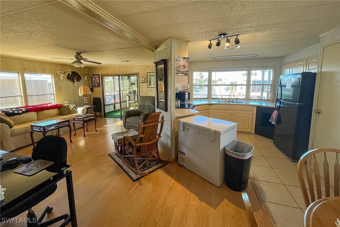 22 Ashe Alva, FL 33920 - Photo 13 of 42 a room with gym equipment and a table