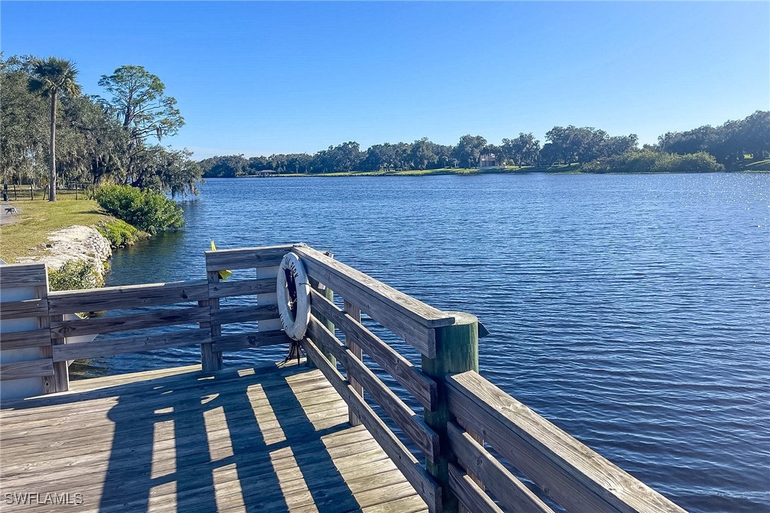 22 Ashe Alva, FL 33920 - Photo 2 of 42 a view of wooden floor with a lake view