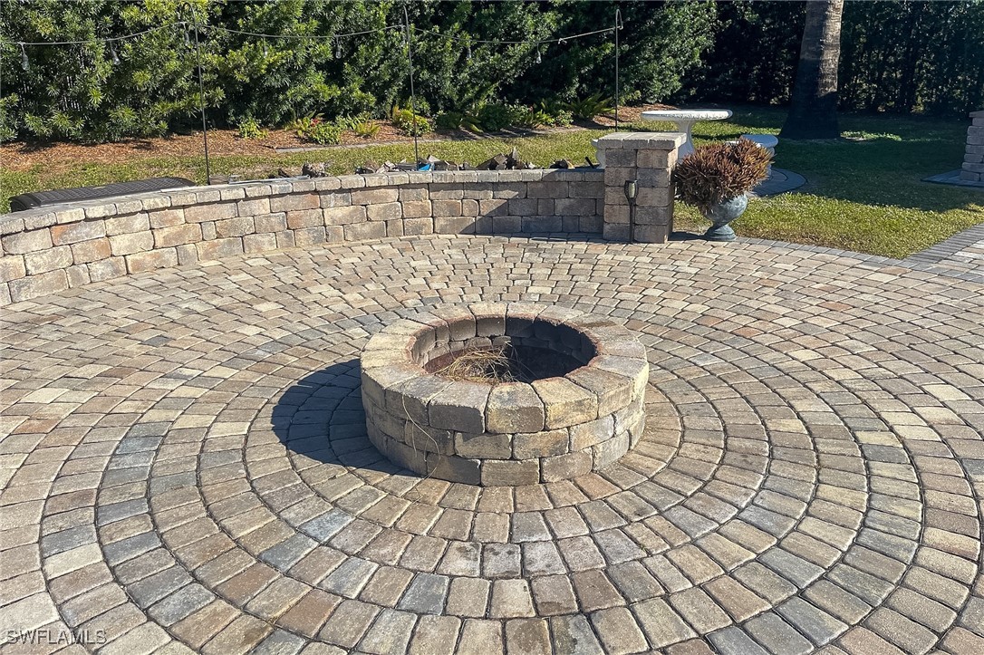 22 Ashe Alva, FL 33920 - Photo 31 of 42 a view of swimming pool with a yard and seating