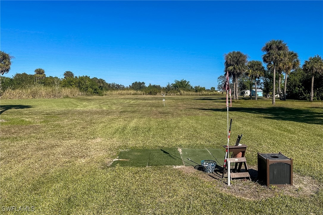 22 Ashe Alva, FL 33920 - Photo 35 of 42 a view of a lake with a mountain in the background