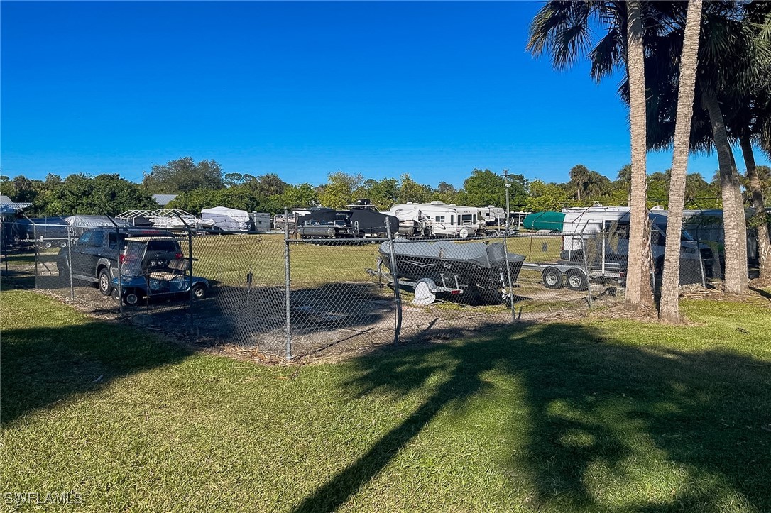 22 Ashe Alva, FL 33920 - Photo 36 of 42 a view of a garden with a sitting area