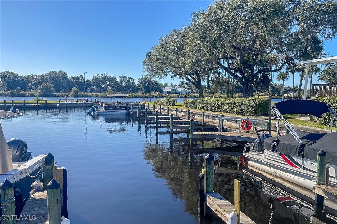 22 Ashe Alva, FL 33920 - Photo 37 of 42 a view of a lake with sitting area