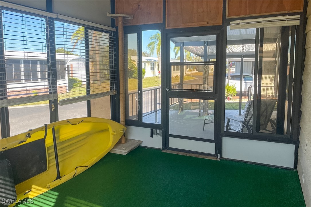 22 Ashe Alva, FL 33920 - Photo 4 of 42 a bed sitting in a room next to a window