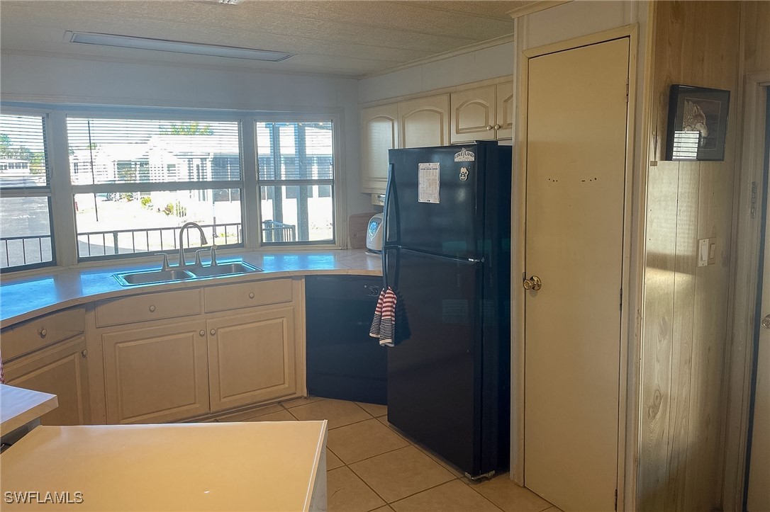 22 Ashe Alva, FL 33920 - Photo 8 of 42 a kitchen with stainless steel appliances granite countertop a refrigerator and a sink