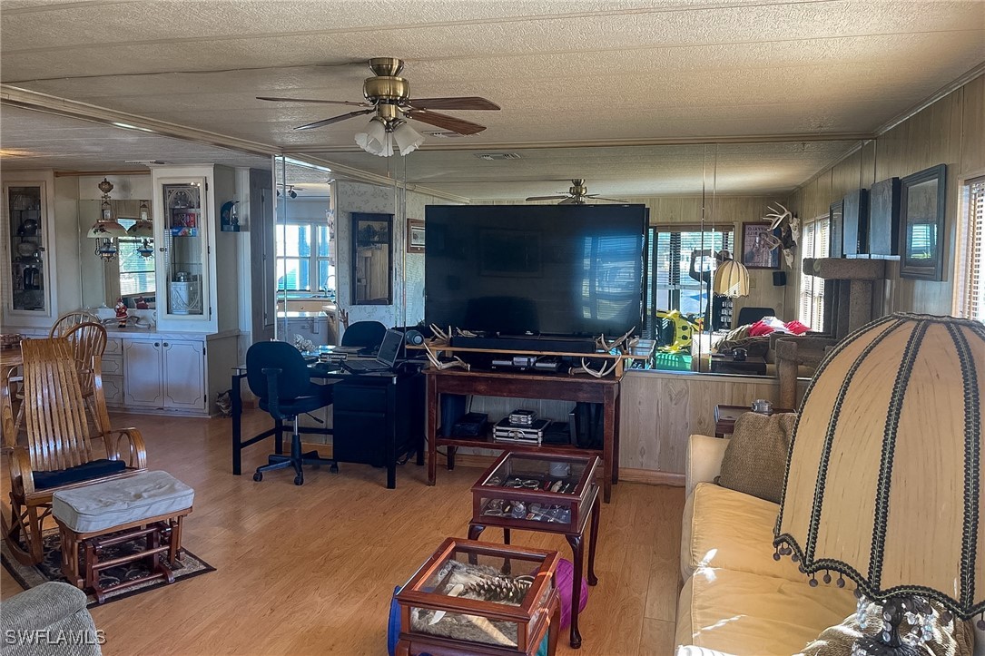 22 Ashe Alva, FL 33920 - Photo 10 of 42 a living room with furniture and a flat screen tv