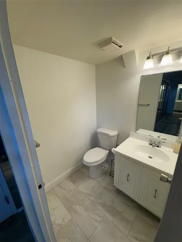 a view of a swimming pool with a garden