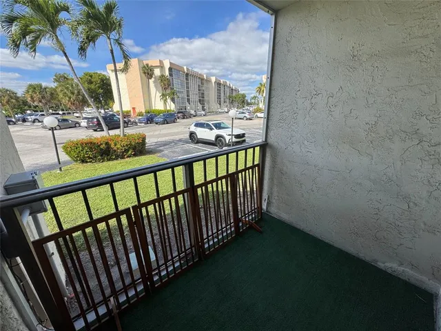 swimming pool view with a outdoor seating space
