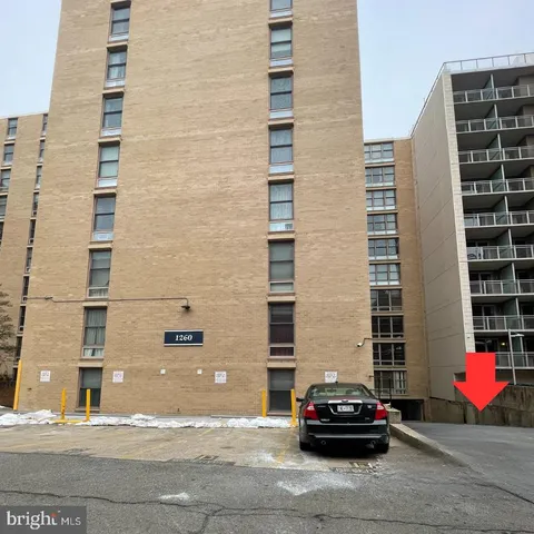 a car parked in front of a building