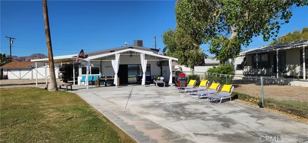 a view of a park with sitting area