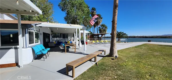 a view of a swimming pool with a patio