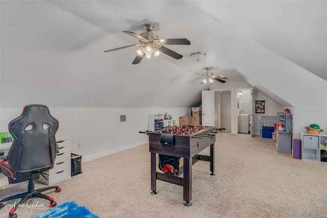 a view of a workspace with furniture