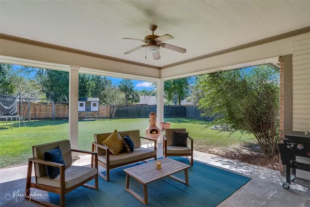 a outdoor living space with furniture and garden view