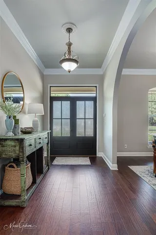 a view of livingroom with kitchen and furniture