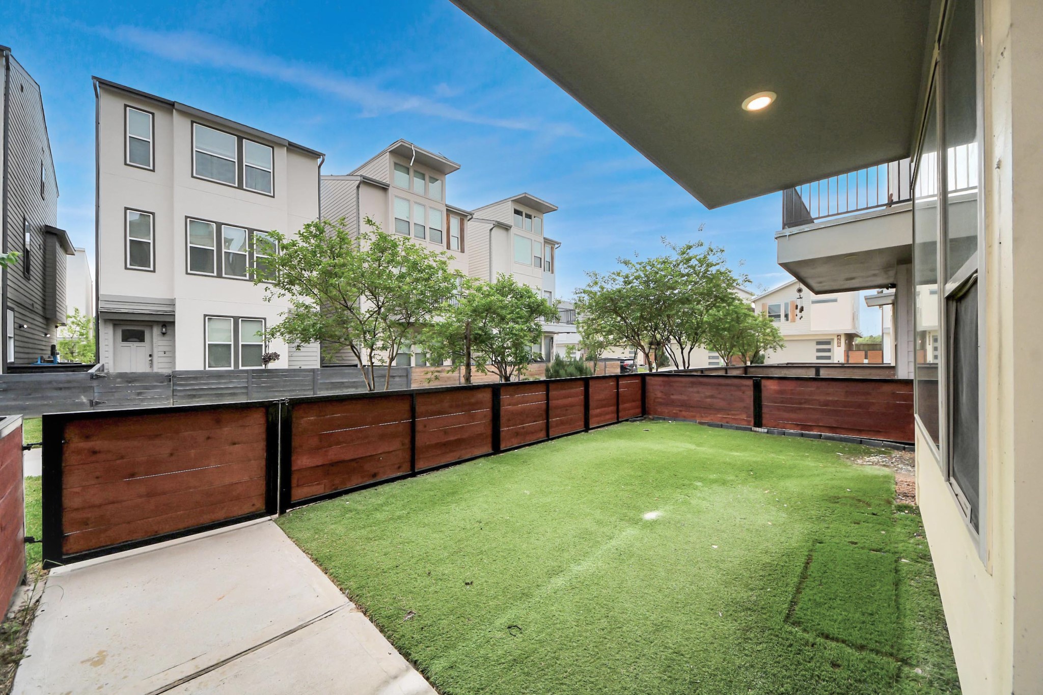 18527 Centro Row Conroe, TX 77385 - Photo 5 of 44 a view of a backyard with plants