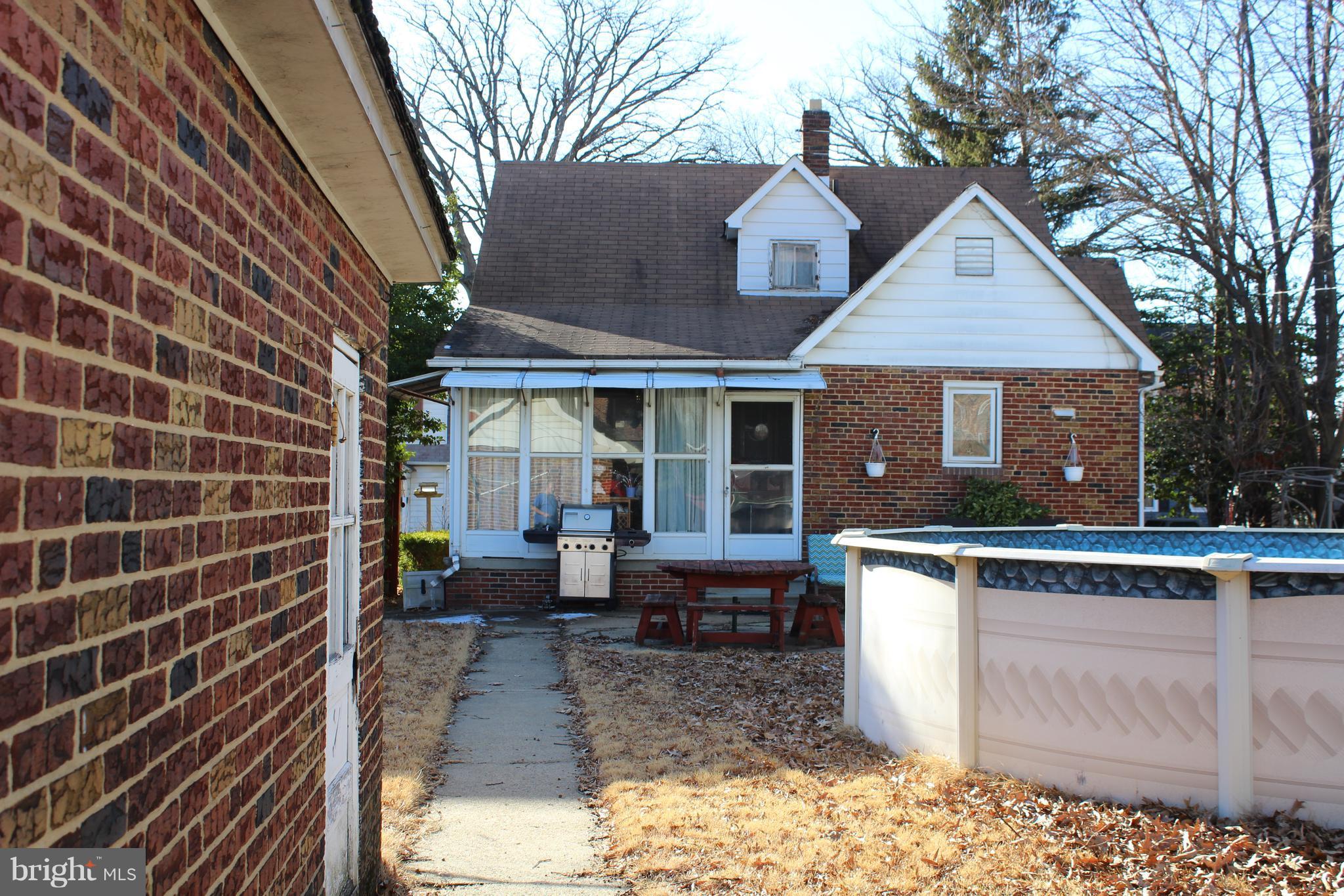 3015 Dunleer Road Baltimore, MD 21222 - Photo 16 of 18 a view of a house with a yard and sitting area