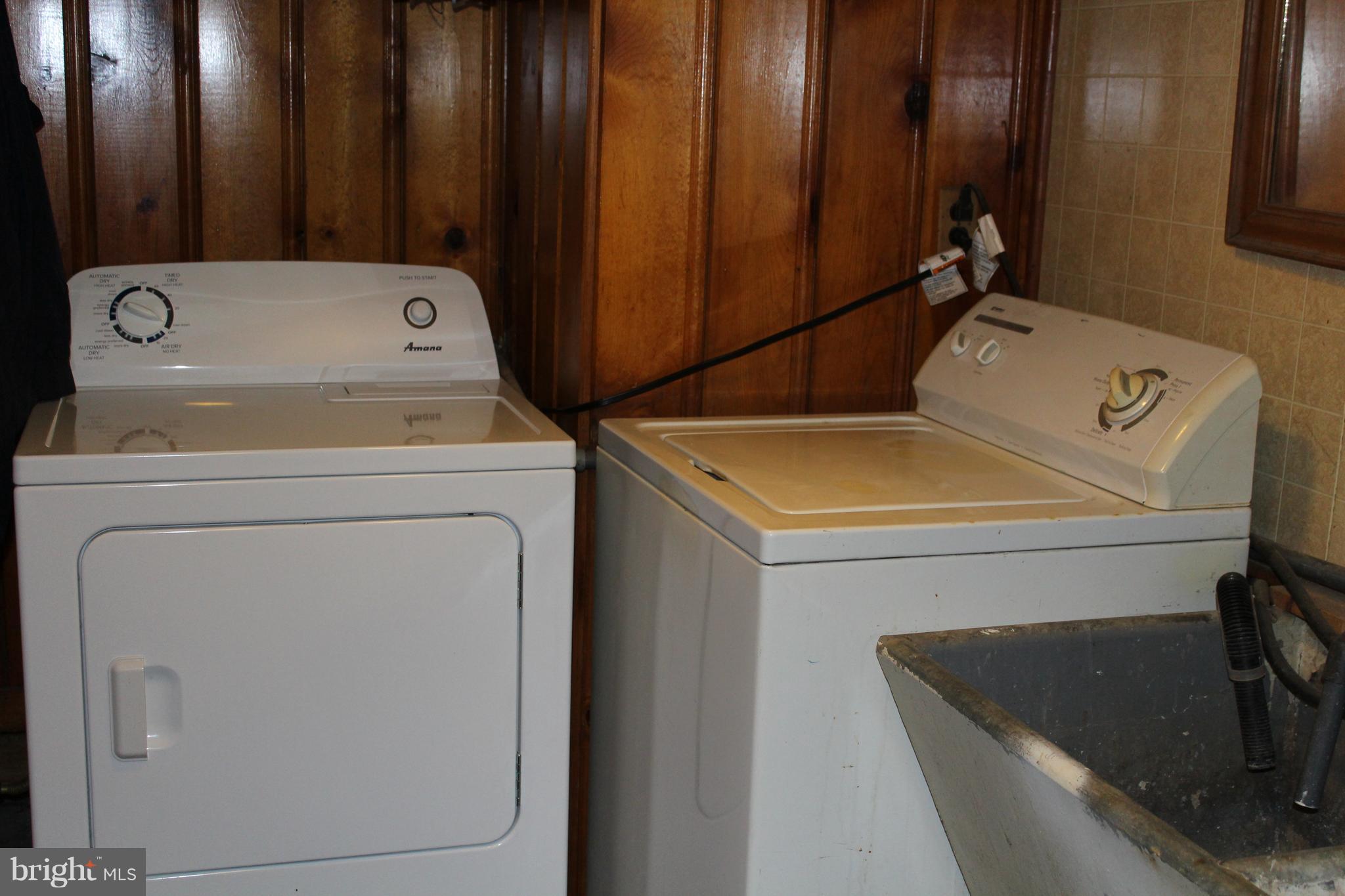 3015 Dunleer Road Baltimore, MD 21222 - Photo 17 of 18 a utility room with dryer and washer