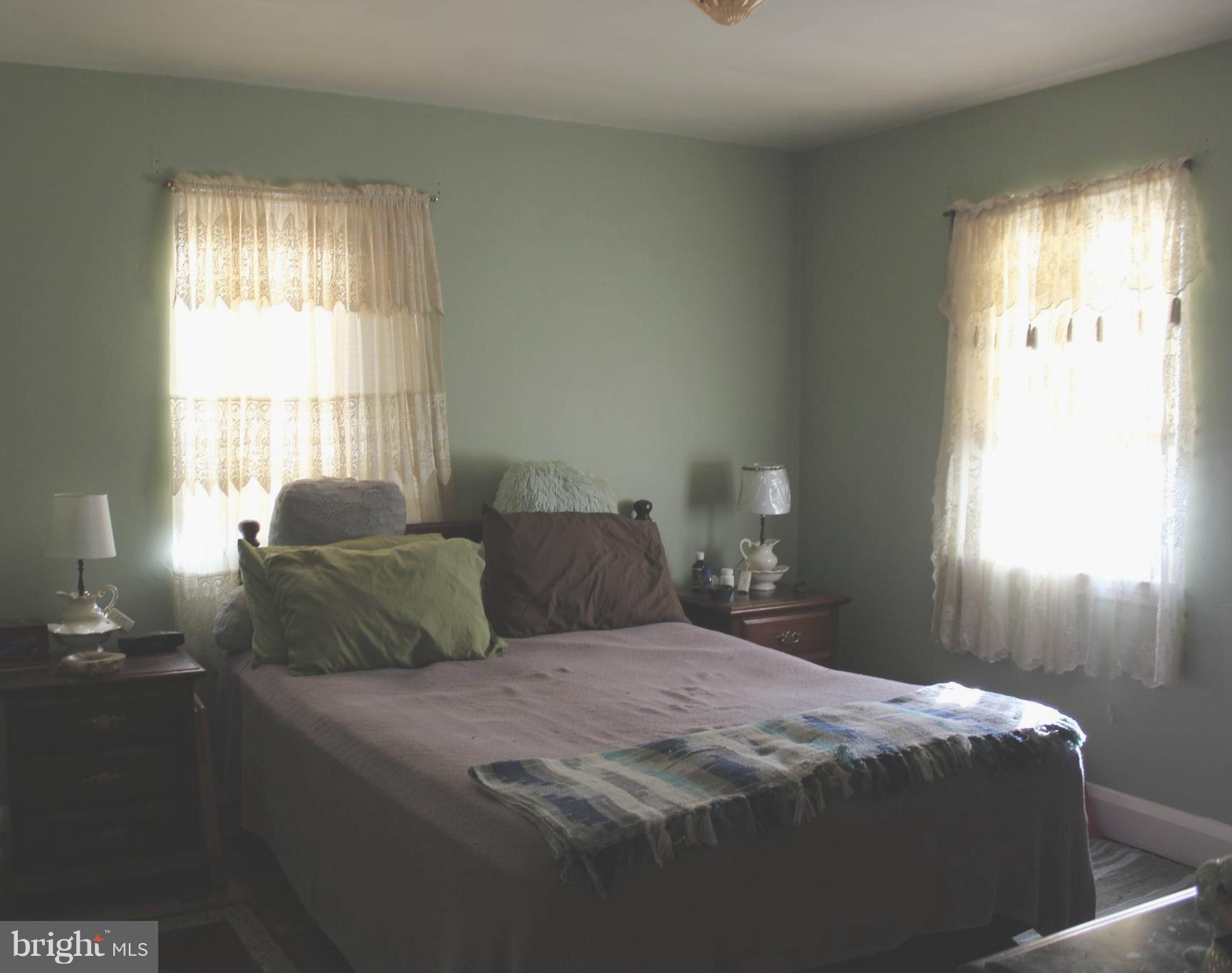 3015 Dunleer Road Baltimore, MD 21222 - Photo 18 of 18 a bedroom with a bed and a window