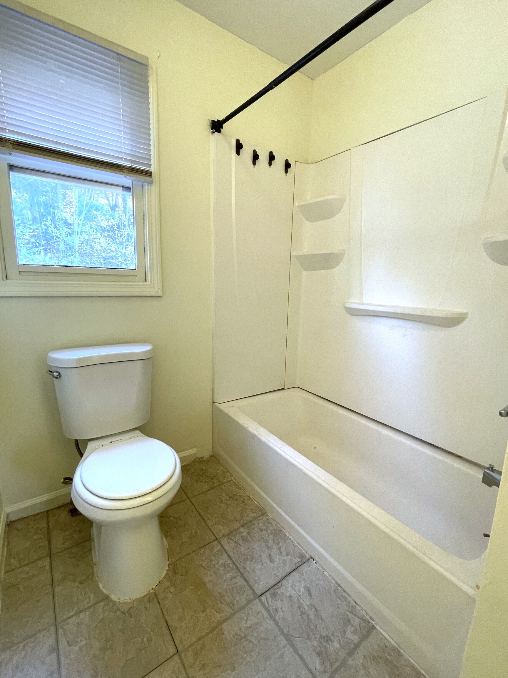 649 Newhall Street, Unit 3 Hamden, CT 06517 - Photo 8 of 9 a bathroom with a toilet and a shower