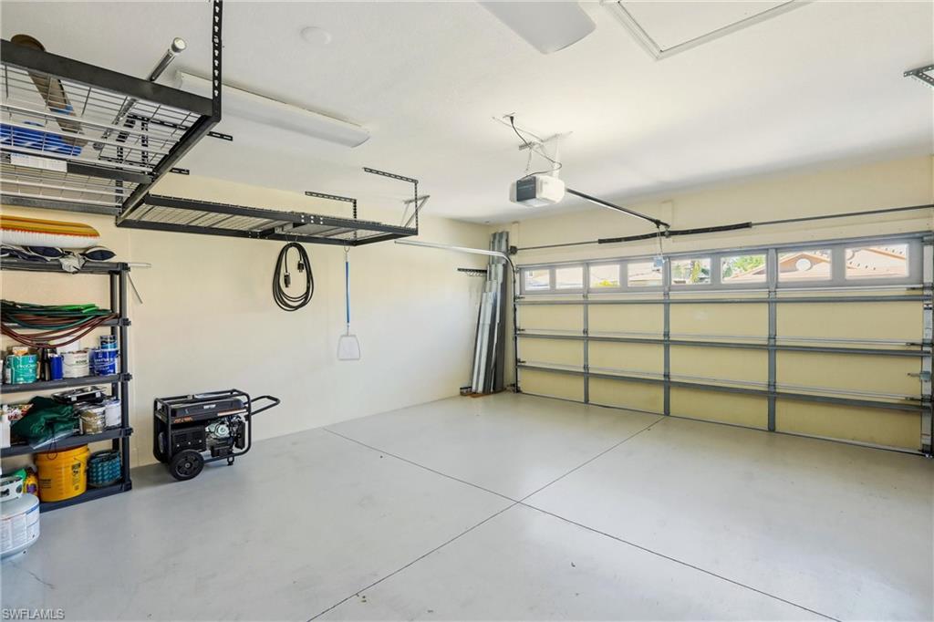 20441 Rookery Drive Estero, FL 33928 - Photo 31 of 41 a view of a garage with storage