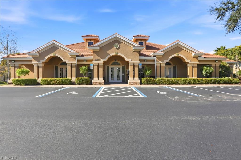 20441 Rookery Drive Estero, FL 33928 - Photo 33 of 41 a front view of a house with a yard