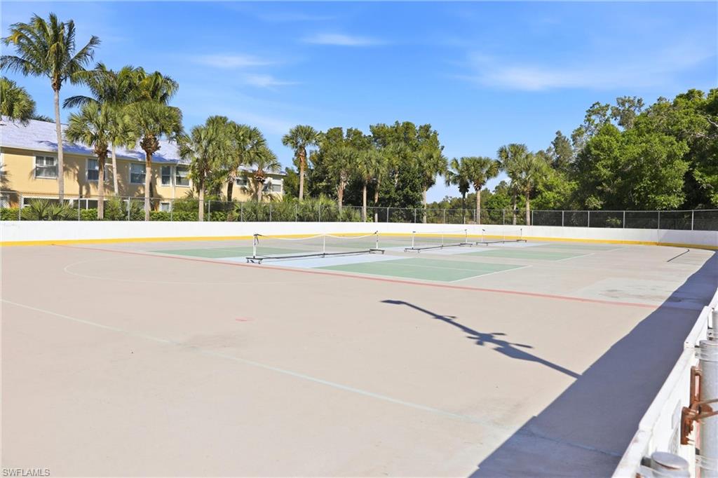 20441 Rookery Drive Estero, FL 33928 - Photo 39 of 41 a view of an outdoor space and tennis court